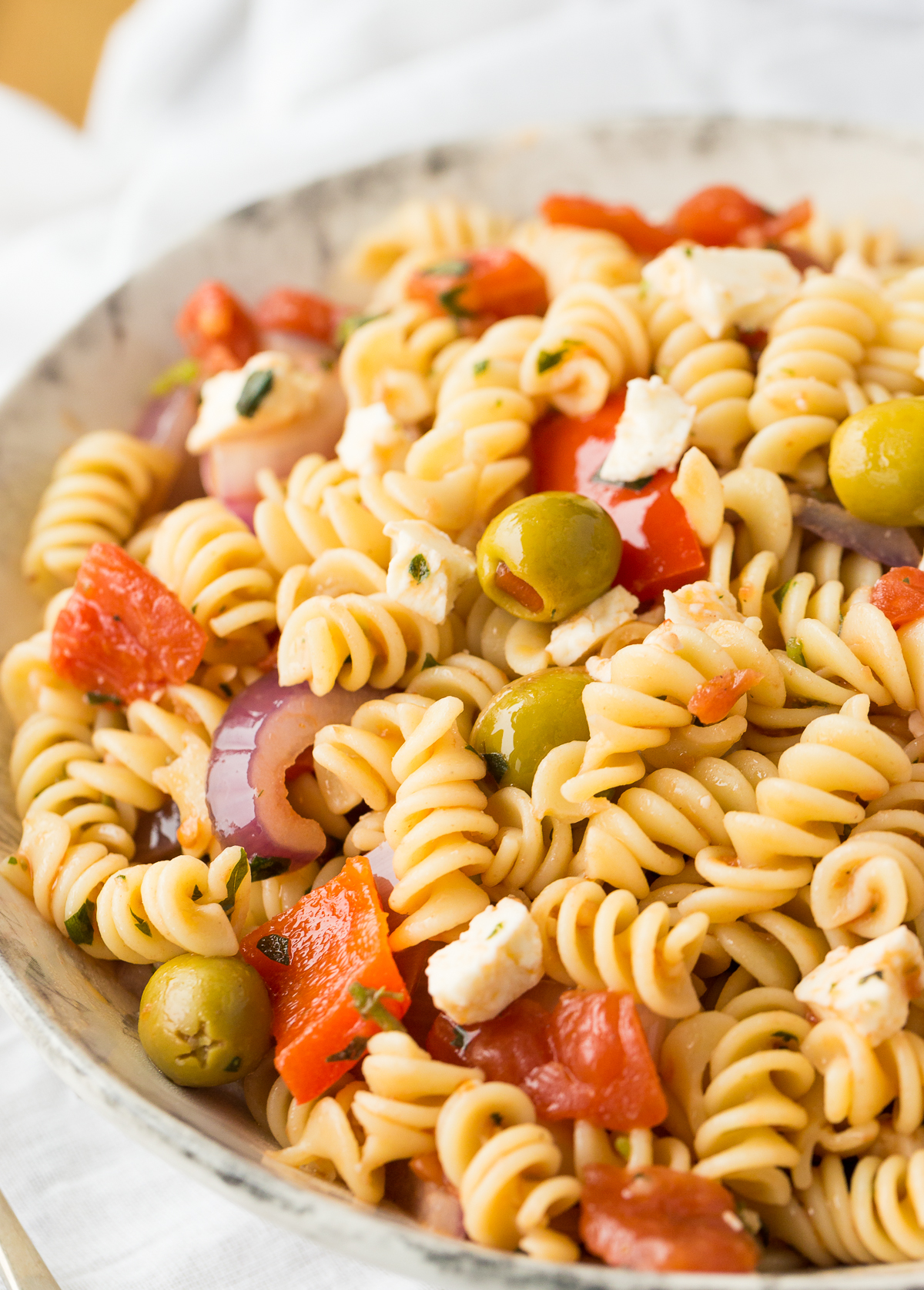 Calabrese pasta salad is a wonderful pasta dish featuring roasted red peppers served either warm or cool as a side dish or entrée.