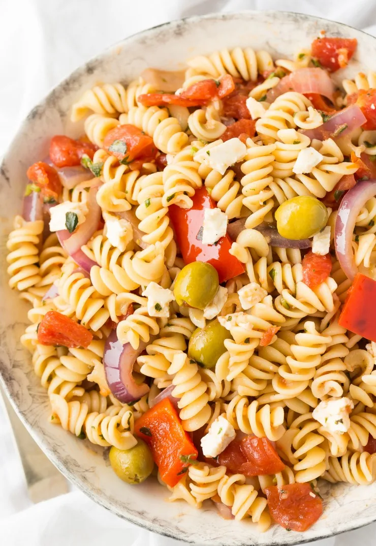 An easy recipe fir Calabrese pasta salad! It is wonderful pasta dish served either warm or cool and it works as both a side dish or as a vegetarian entrée. 