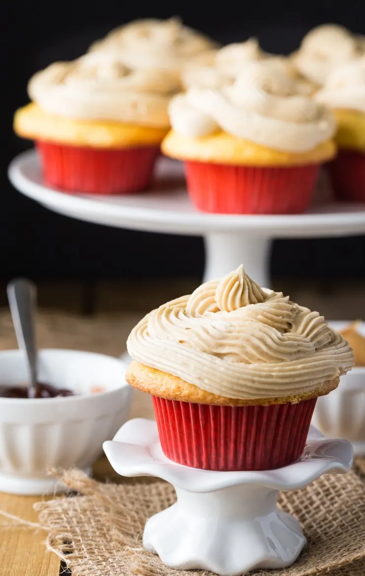 These Peanut Butter & Jelly Cupcakes turn a classic sandwich into an easy to make and very nostalgic cupcake. Perfect for all the pb & j lovers out there!
