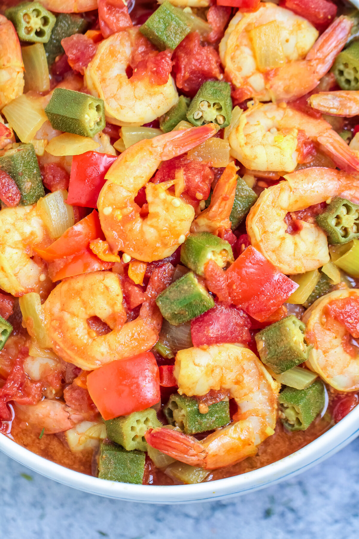 This Caribbean Okra and Shrimp recipe is a simple, spicy, and flavourful stew featuring plump shrimp, crisp okra and scotch bonnet peppers.