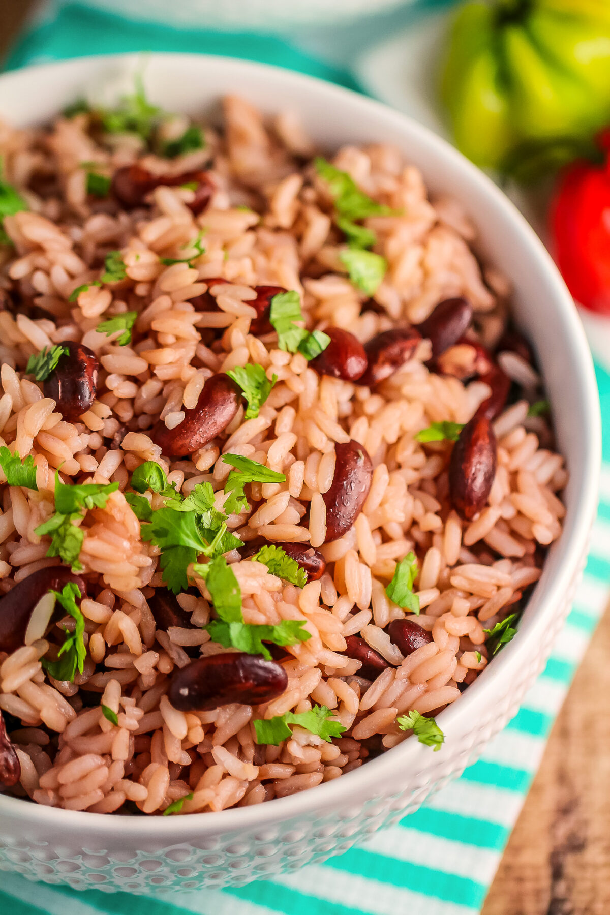 This Jamaican Rice and Peas recipe is an authentic recipe for the traditional Jamaican side dish featuring fragrant thyme and coconut milk! 