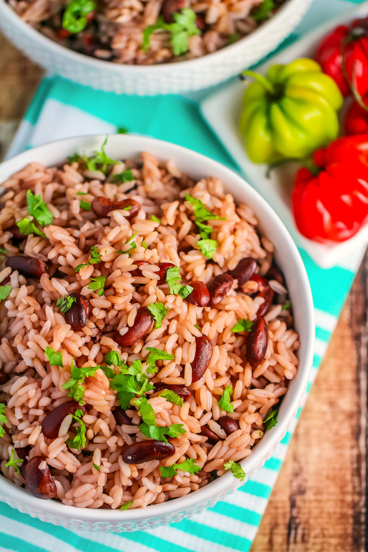 This Jamaican Rice and Peas recipe is an authentic recipe for the traditional Jamaican side dish featuring fragrant thyme and coconut milk! 