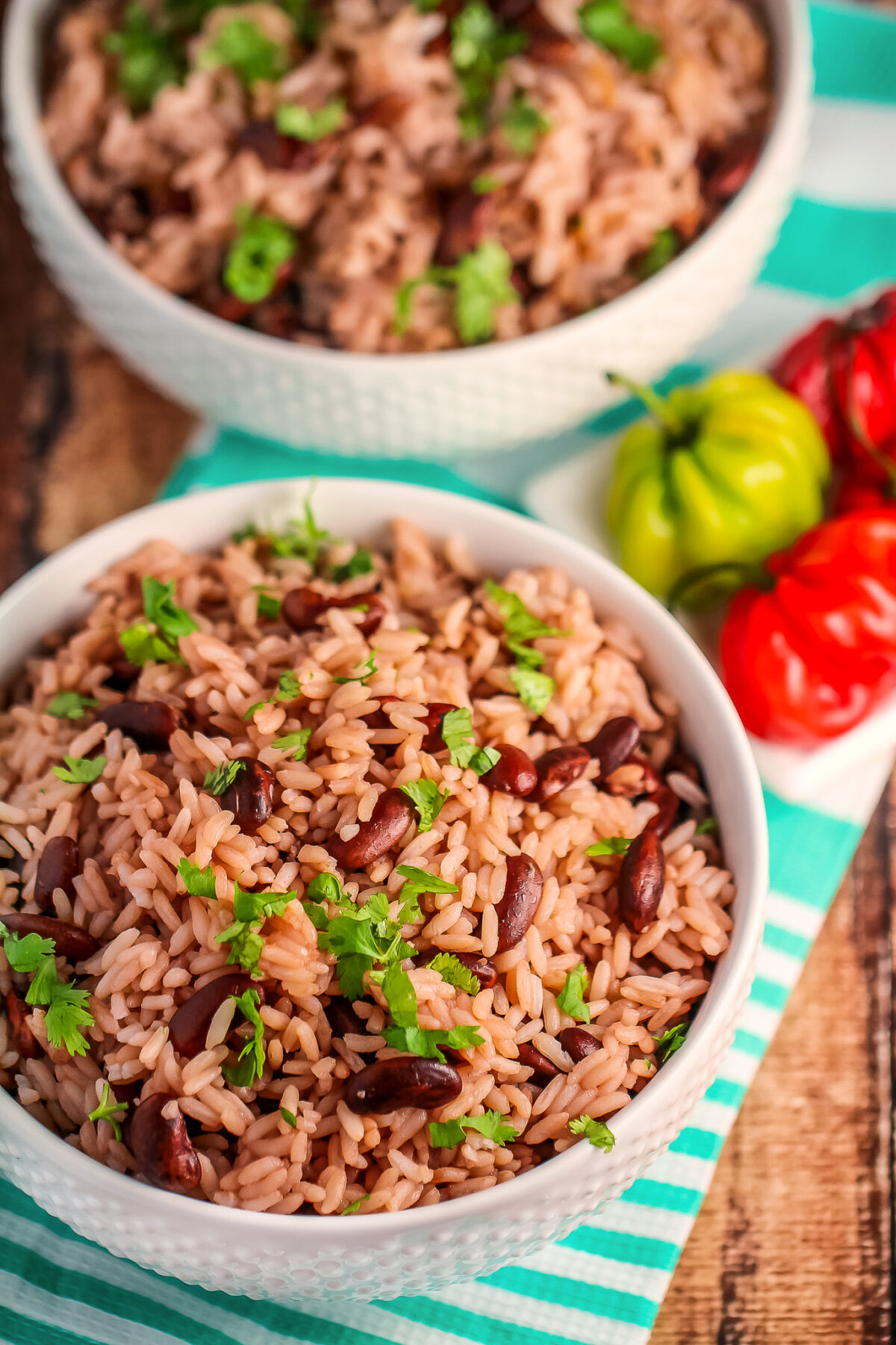 This Jamaican Rice and Peas recipe is an authentic recipe for the traditional Jamaican side dish featuring fragrant thyme and coconut milk! 