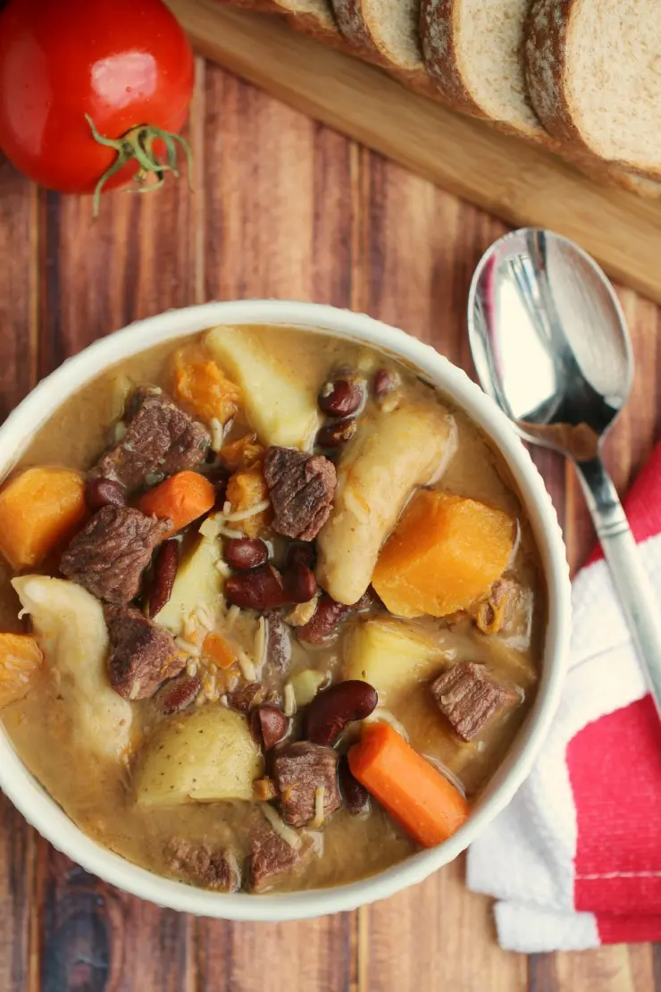 This Jamaican Pumpkin Beef Soup is filled with dumplings, Jamaican Pumpkin & Beef. Perfect for a delicious and filling family dinner!