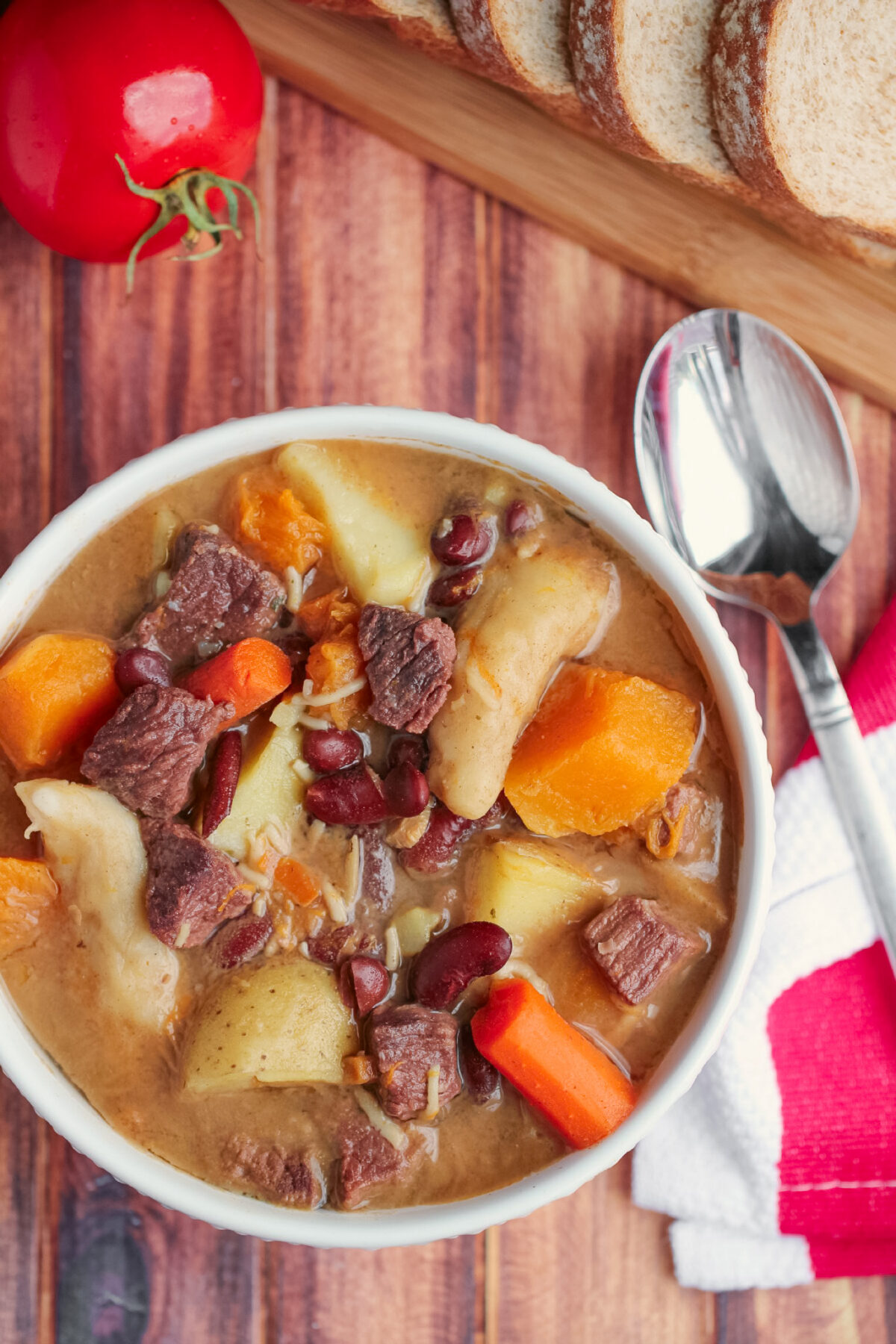 This Jamaican Pumpkin Beef Soup is filled with dumplings, Jamaican pumpkin & beef. Perfect for a delicious and filling family dinner!