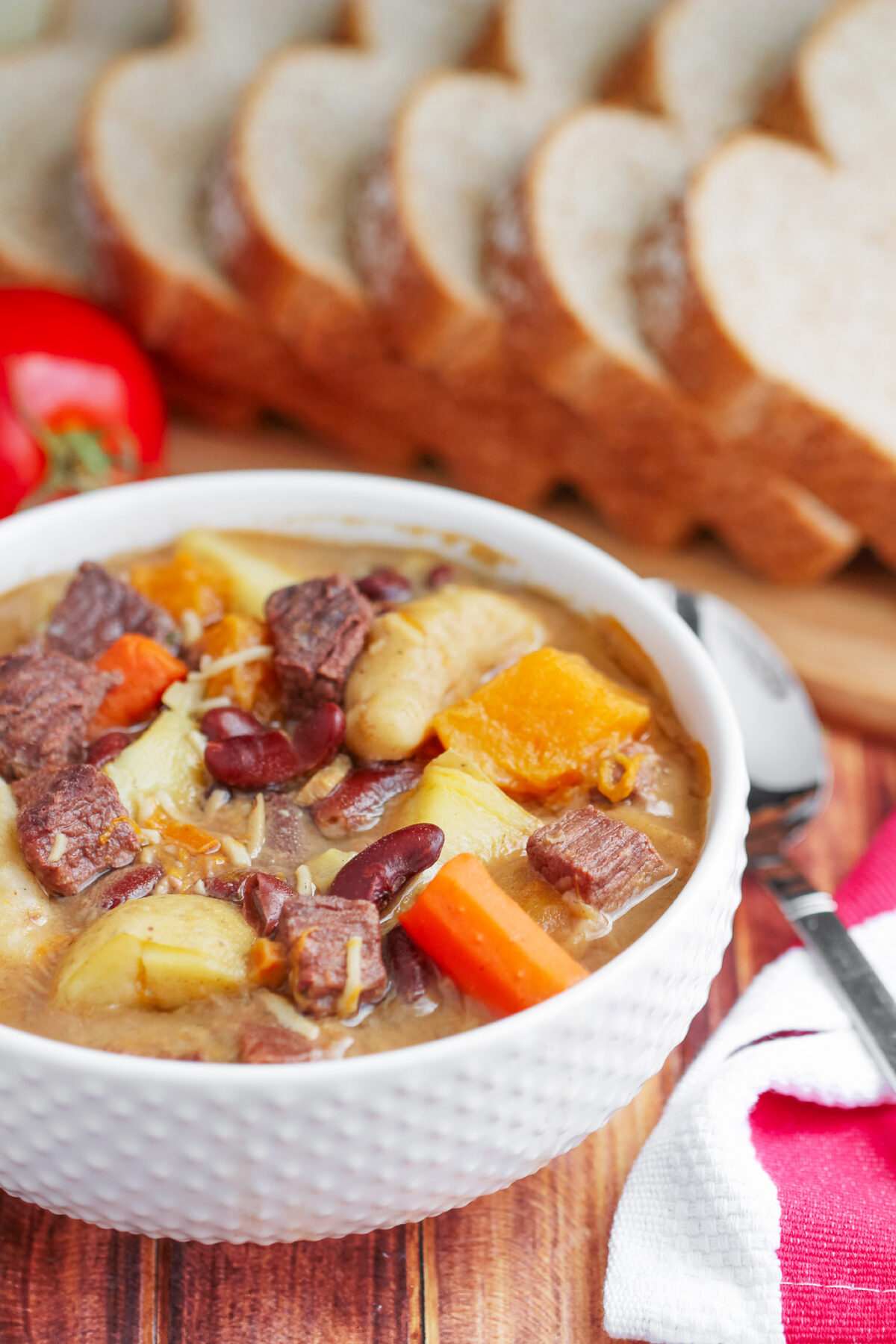 This Jamaican Pumpkin Beef Soup is filled with dumplings, Jamaican pumpkin & beef. Perfect for a delicious and filling family dinner!