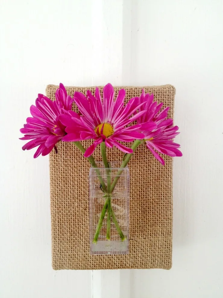 This Simple Spring Flower Sconce is an easy diy that adds a nice Spring touch to your home decor!
