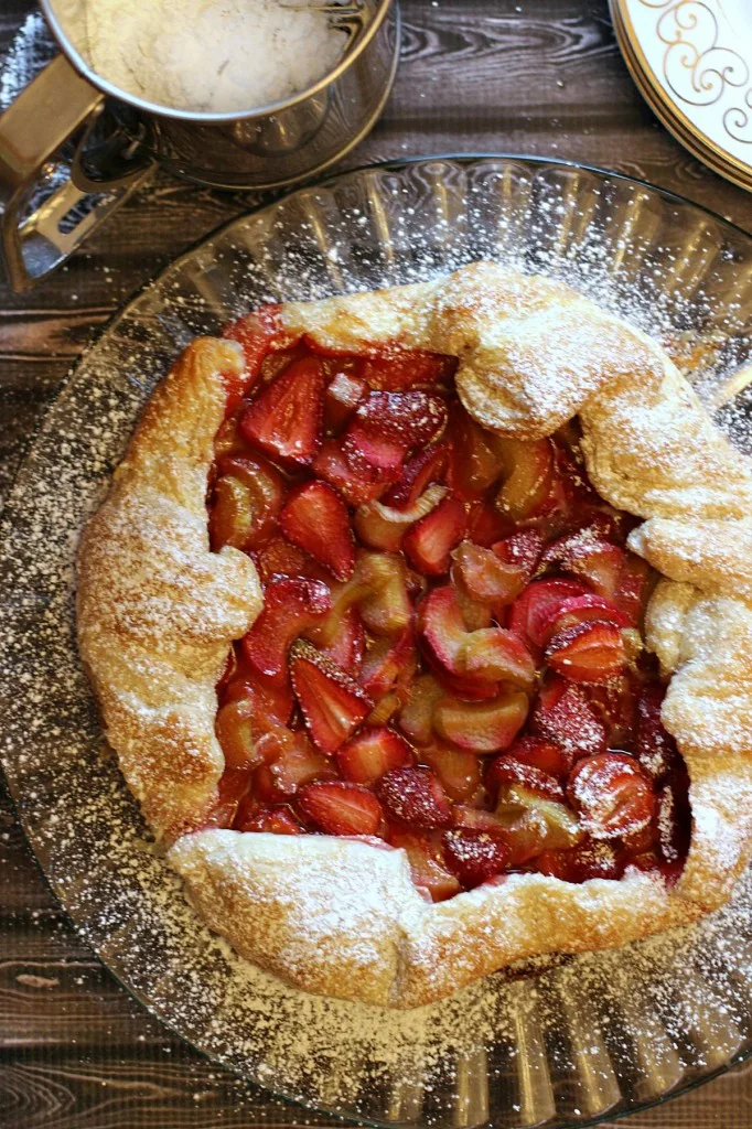 This Strawberry Rhubarb Galette is a perfect summer dessert full of all the very best flavours baked in a flaky all-butter puff pastry!