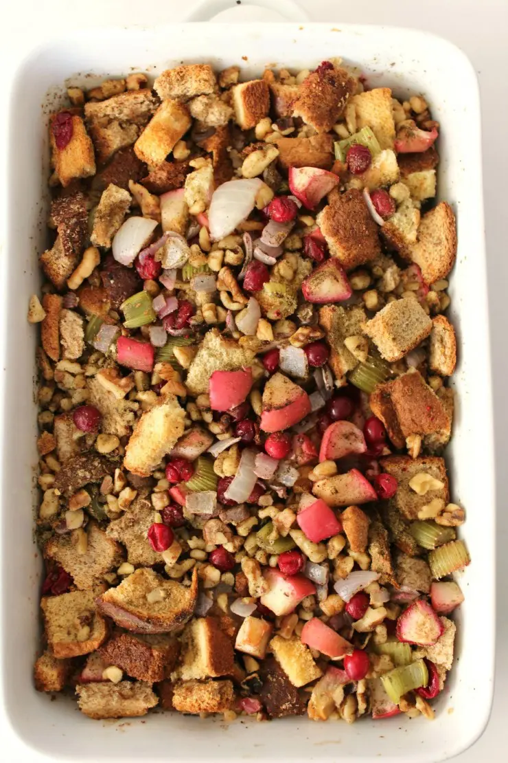 This Cranberry Apple Walnut Dressing is a perfect holiday stuffing recipe. Great for Thanksgiving and Christmas dinner!