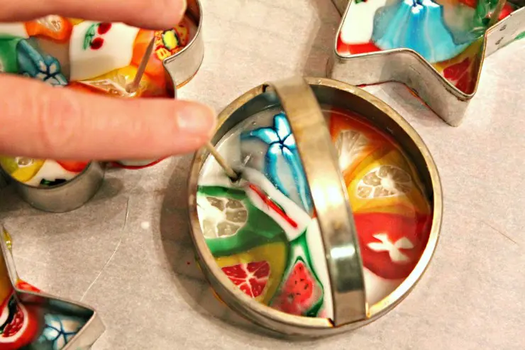 These Christmas Candy Ornaments are a surprisingly easy diy craft idea. Perfect for hanging on your Christmas tree or giving as gifts!