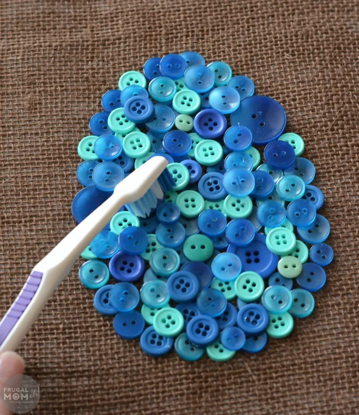 This easy DIY Easter Egg Button Art is a great home decor project for the Easter season. Includes a free printable template!