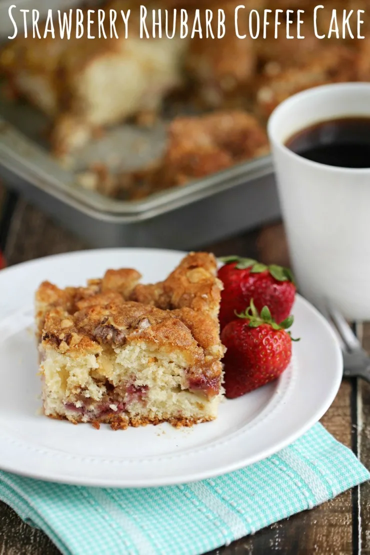 This Strawberry Rhubarb Coffee Cake is a perfect dessert to serve guests.  I won't judge if you eat it for breakfast though.  Our secret!