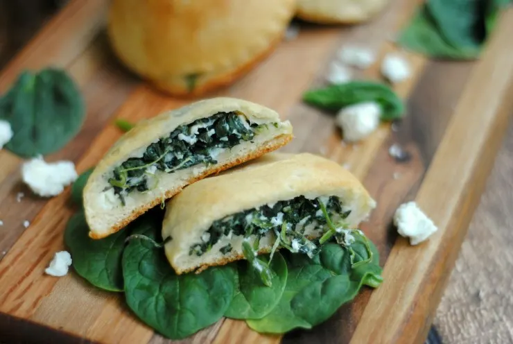 These Spinach & Feta Hand Pies make for not only an awesome appetizer but are great for a delicious lunch or dinner for the whole family. 