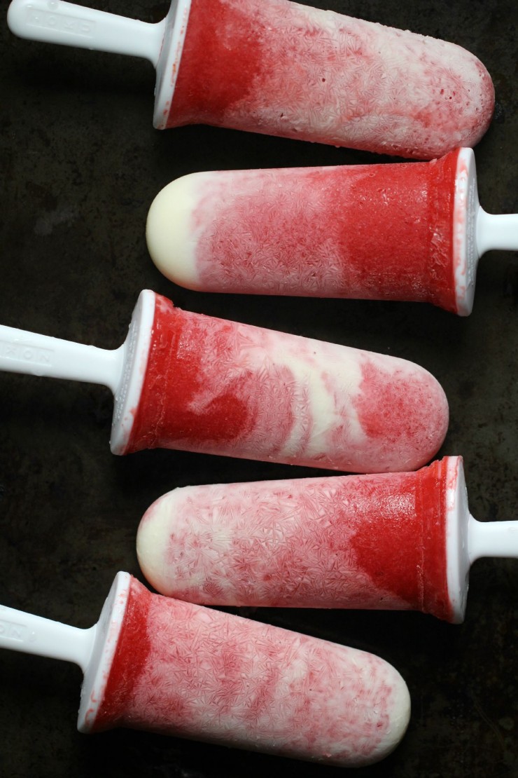 These Strawberries & Cream Ice Pops are made with lush strawberries and real cream for an amazing summer treat!