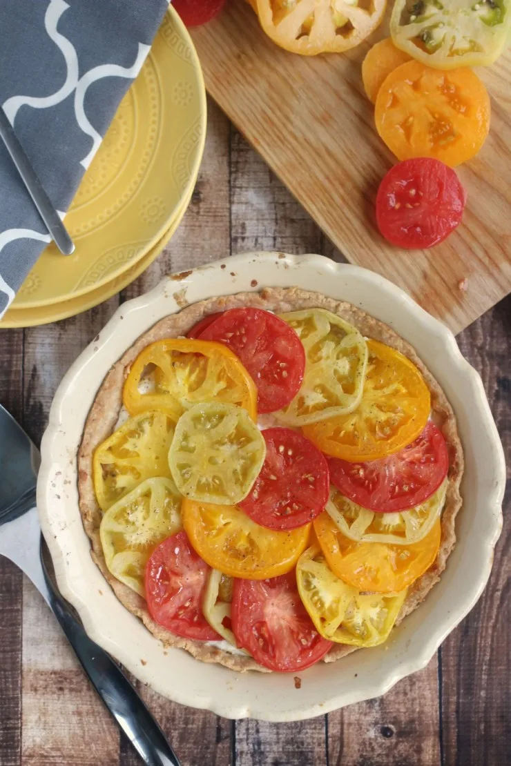 This Heirloom Tomato Tart really highlights the beauty and flavour of garden fresh heirloom tomatoes.  This is a summer recipe that is sure to be a hit!