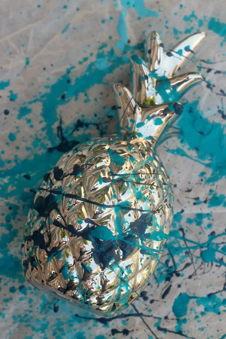 This Paint Splatter Pineapple Home Decor is a fun and easy home decor project that anyone can do!