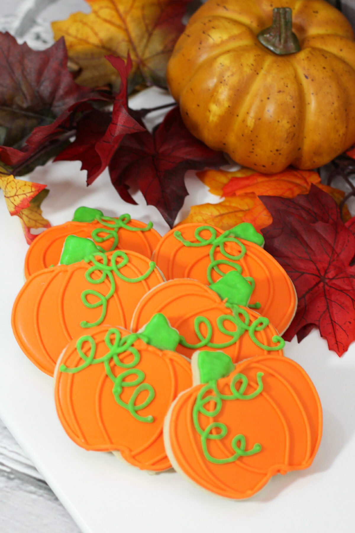 These pumpkin sugar cookies are perfect for fall, with a buttery cut-out cookie base and colourful royal icing for decorating.
