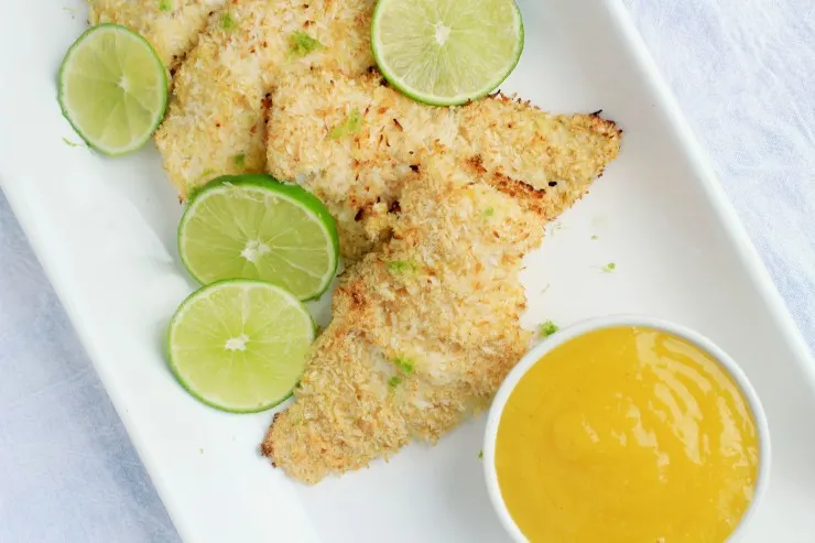 This Coconut Crusted Cod with Mango Sauce can be made in 20 minutes and is full of Caribbean Flavours! 