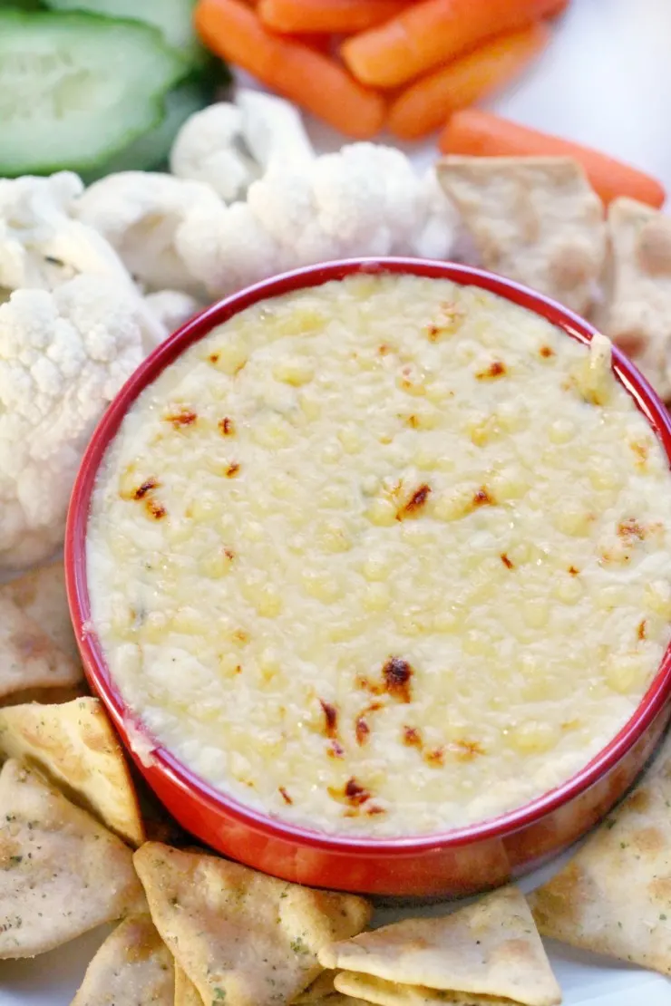 This Hot Cheese Dip with Emmental is an easy-to-make hot dip. The dijon mustard & white wine lends extra depth to this crowd-pleasing baked dip.