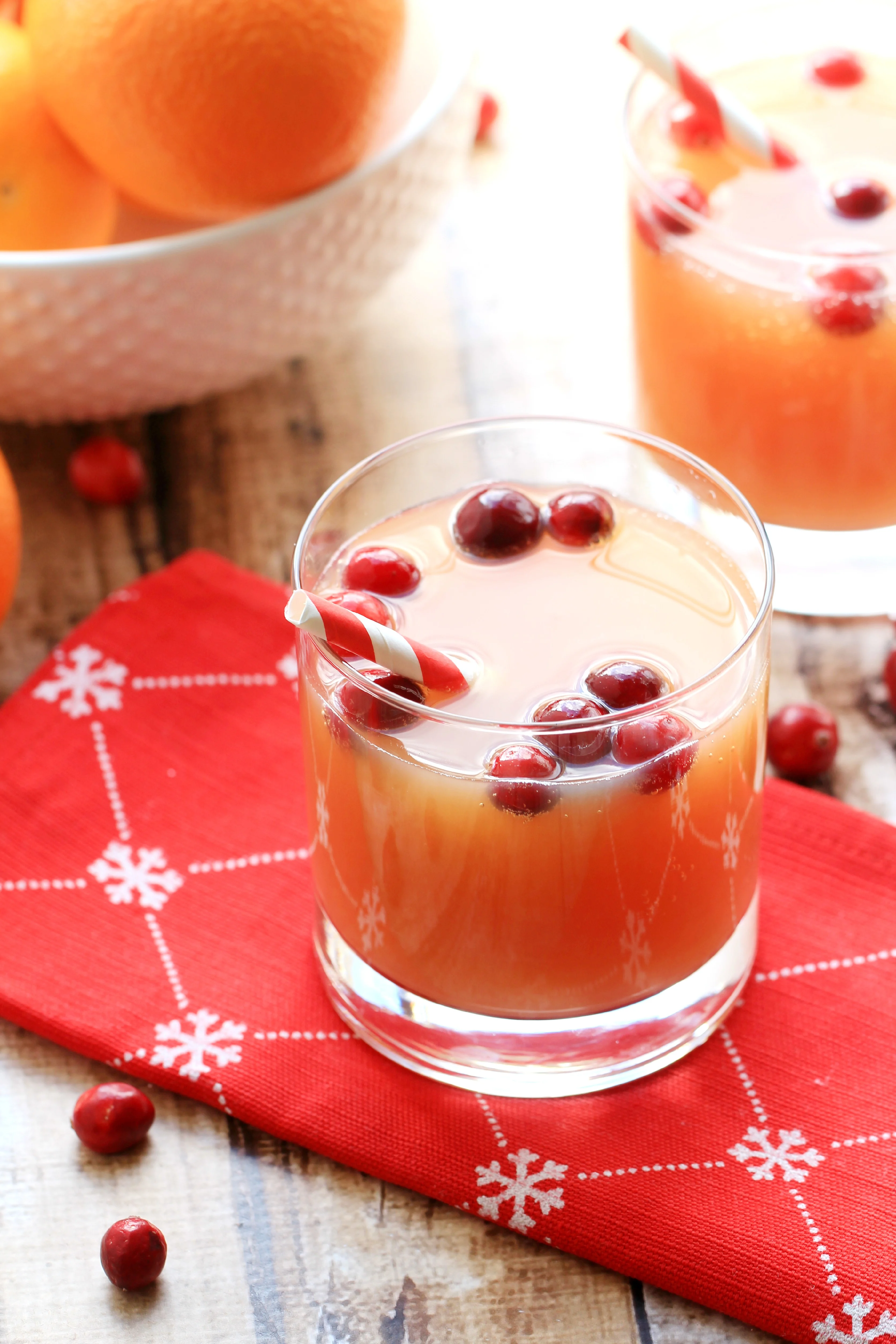 This Non-Alcoholic Cranberry Orange Spritzer is a festive drink for the holidays that everyone can enjoy.