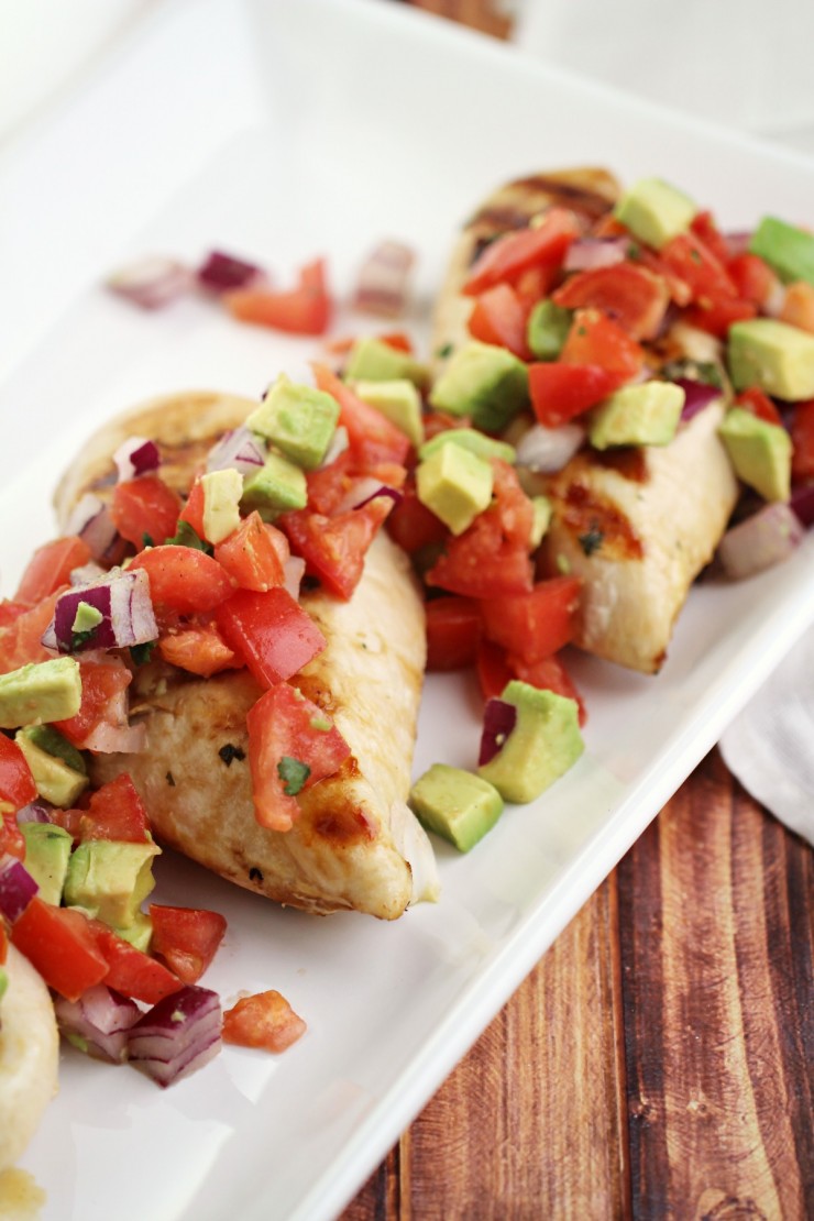 This Cilantro Lime Chicken with Fresh Avocado Salsa is delicious served with rice for a fresh tasting family dinner. It's also a heart healthy recipe!