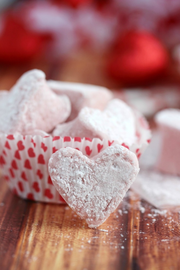These homemade Cinnamon Heart Marshmallows are soft and squishy with all the flavour of Cinnamon heart candy. An easy-to-make Valentine's Day treat!