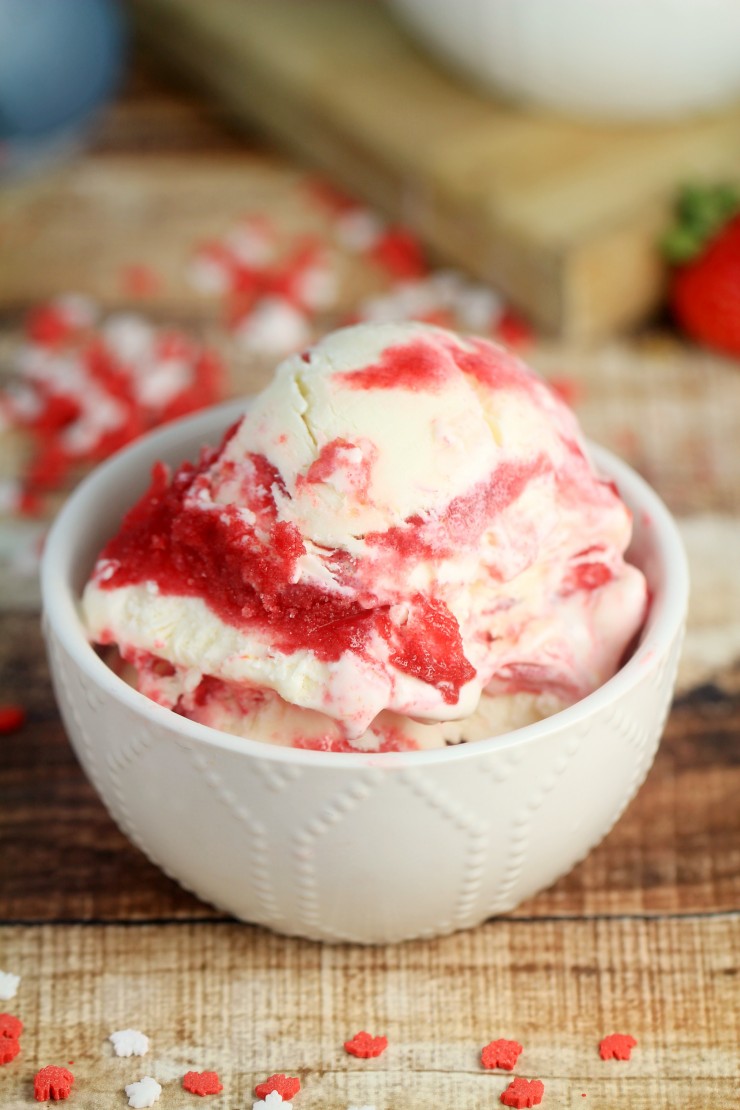 Kids will love this super easy to make, no churn Strawberry Jell-O Swirl Ice Cream recipe. It’s super fun and bright, plus full of fruity swirls of flavour! It makes for a fun treat on Canada Day too!