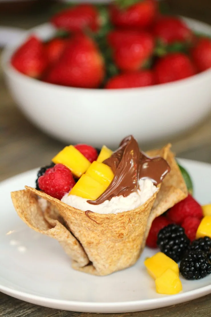 Bite into a crisp tortilla cup filled with a refreshing medley of mango, blackberry, raspberry and Nutella®. Add a little joy to everyone’s morning by serving this delightful breakfast.
