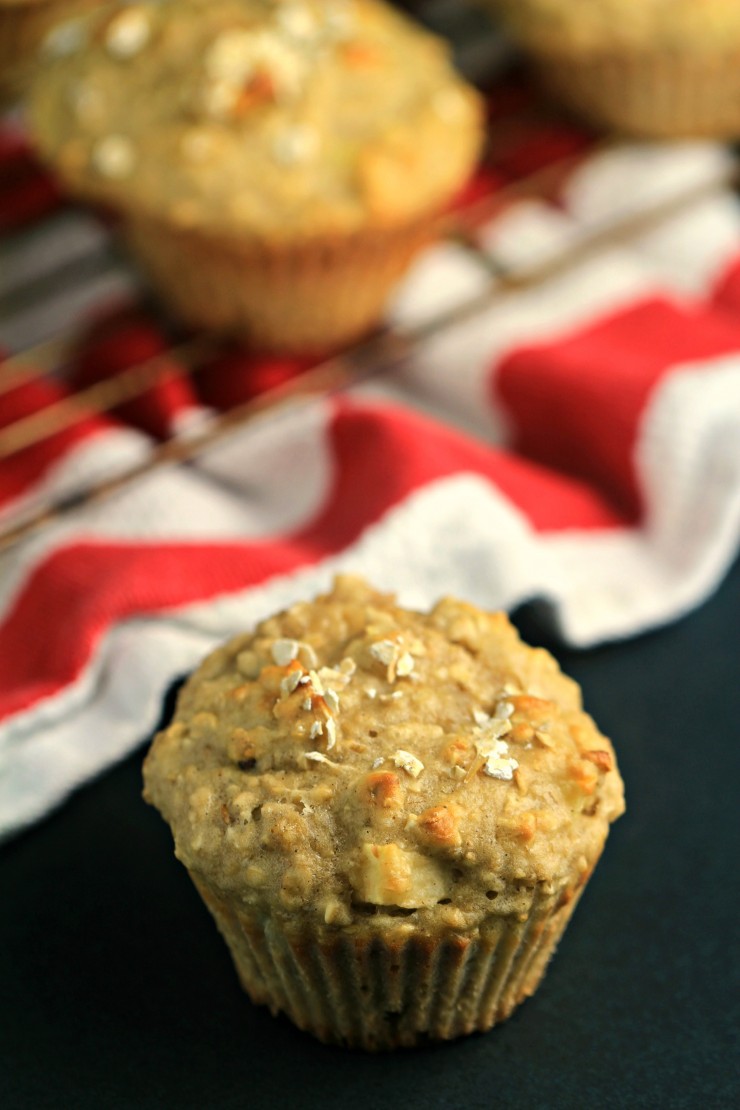 These Apple Oatmeal Greek Yogurt Muffins are bursting with apples and oats. They make for a healthier muffin made with NO butter or oil! Perfect for breakfast, dessert or a light snack.