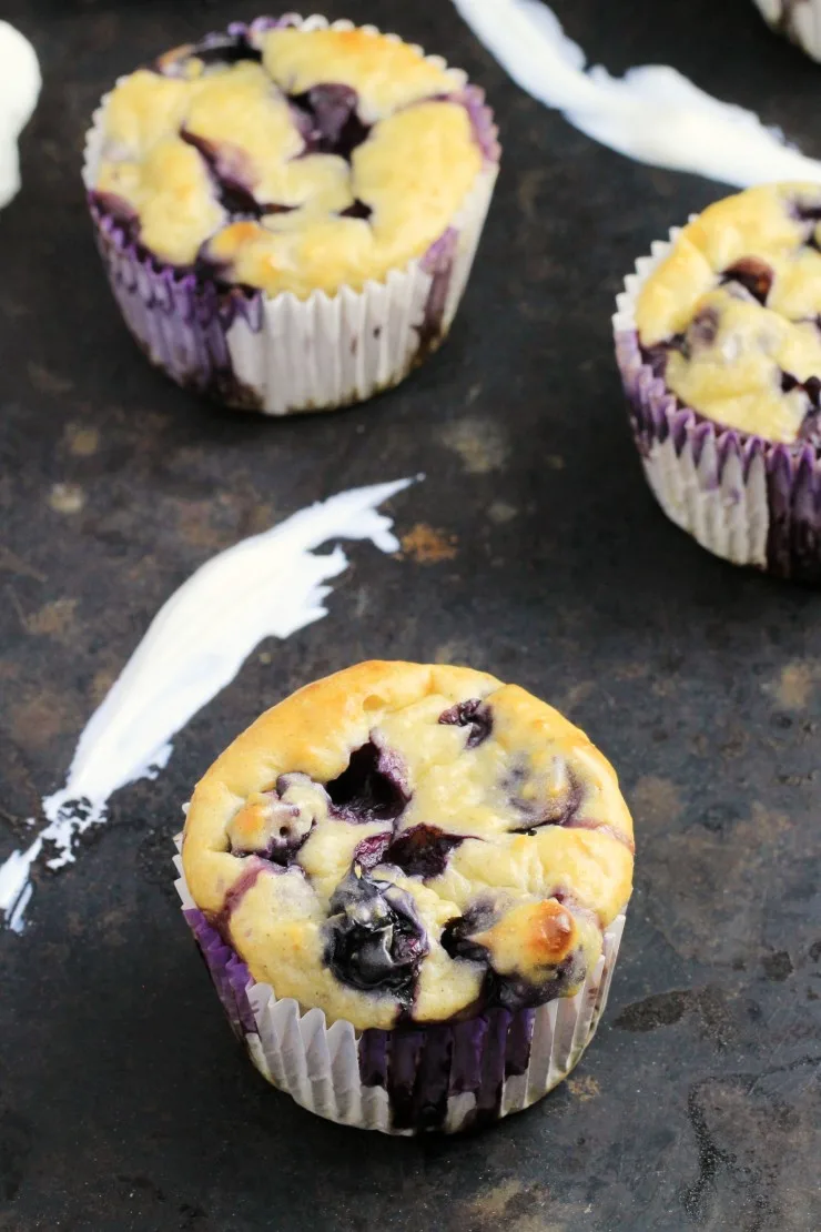 These Blueberry Oatmeal Greek Yogurt Muffins are bursting with blueberries and oats and make for a healthier muffin made with NO butter or oil! Perfect for breakfast, dessert or a light snack.