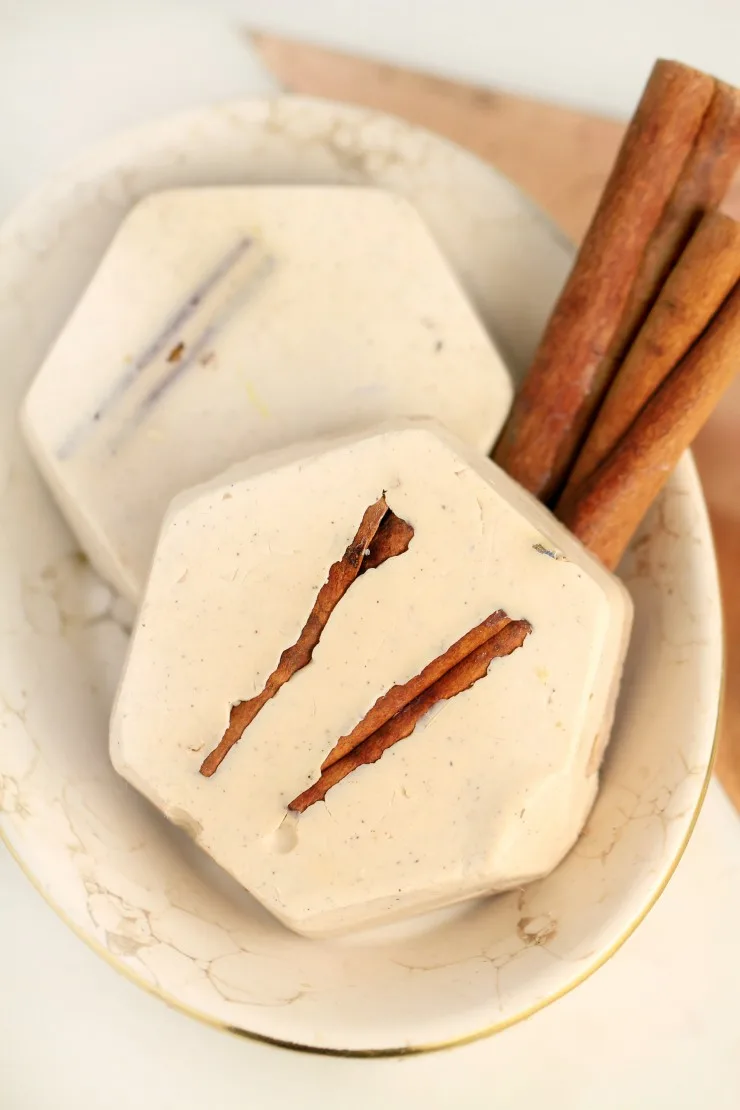  The ground cinnamon in this cinnamon shea butter soap imparts a beautiful speckled-brown natural hue while the cinnamon essential oil adds spice and a home-baked scent. This DIY soap recipe is a really great Christmas gift idea! 