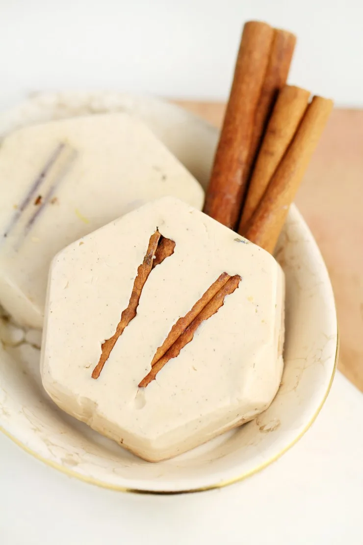  The ground cinnamon in this cinnamon shea butter soap imparts a beautiful speckled-brown natural hue while the cinnamon essential oil adds spice and a home-baked scent. This DIY soap recipe is a really great Christmas gift idea! 