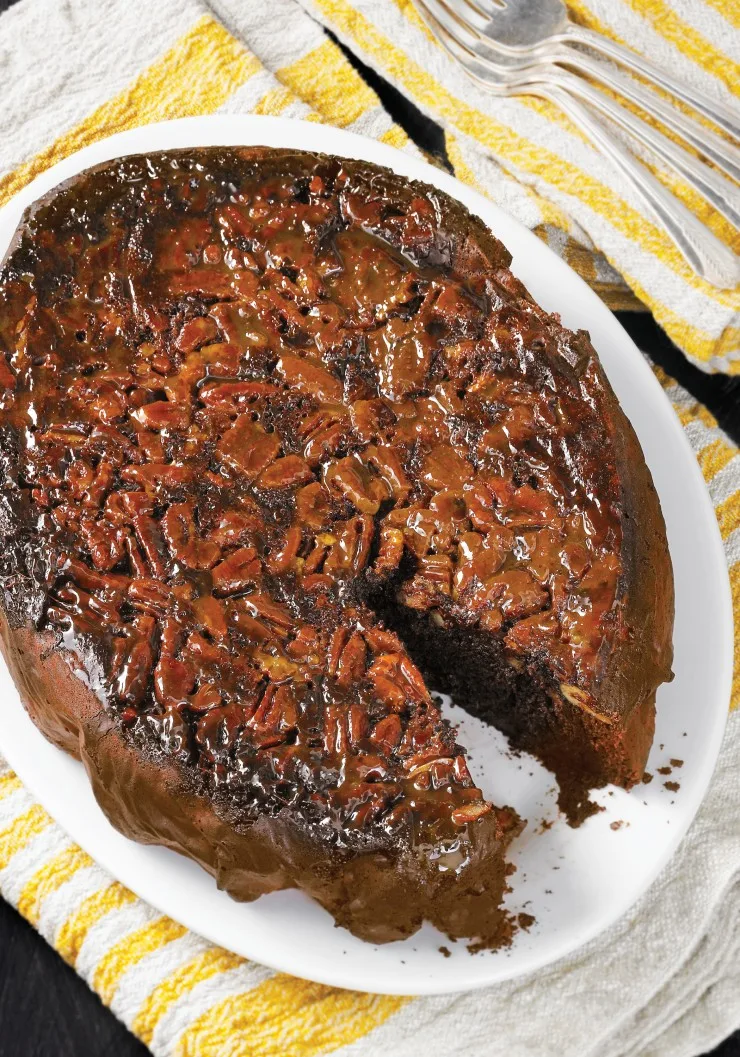 Slow-Cooker Chocolate Caramel Pecan Upside-Down Cake. The edges of the pecan layer will get chewy, the center stays softer. This cake will make a lot of people happy!