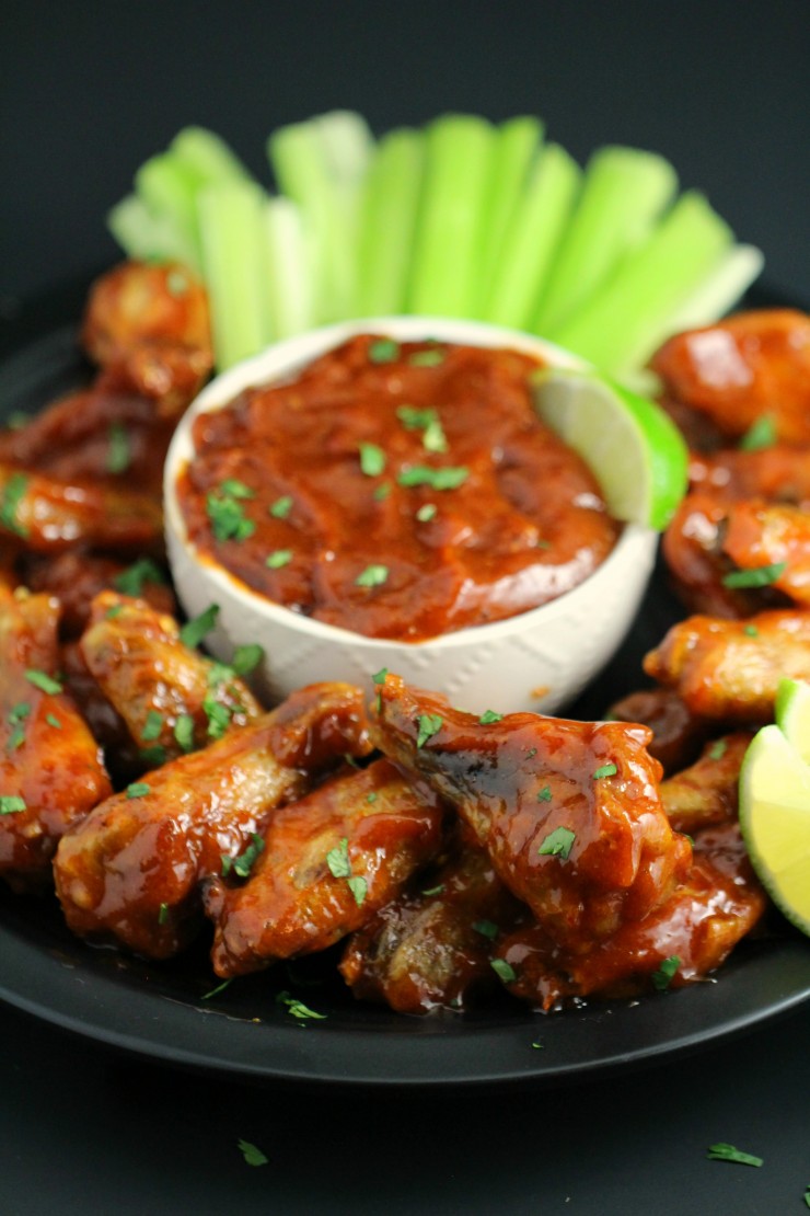 These wings are a little bit sweet with a touch of sweet. They are basically guaranteed to fly off plate at any party you serve these Honey Chipotle Chicken Wings at.