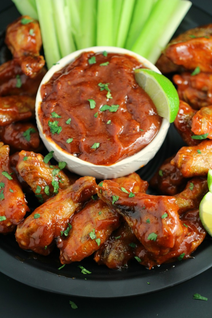 These wings are a little bit sweet with a touch of sweet. They are basically guaranteed to fly off plate at any party you serve these Honey Chipotle Chicken Wings at.