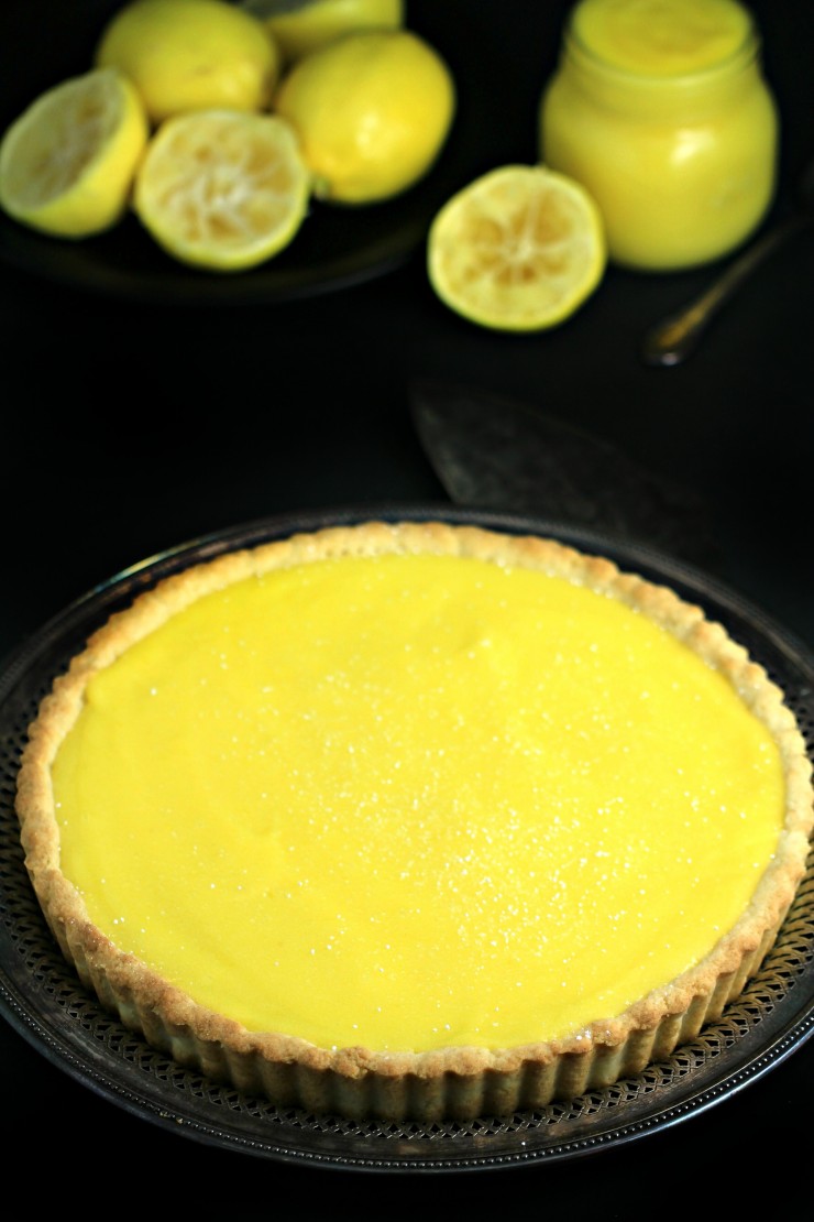 Tart and tangy this lemon tart is deliciously sweet with a shortbread crust that is to die for. This is an impressive from-scratch dessert that is creamy, delicious and easy! 