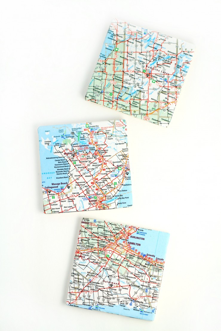 Upcycle old maps to create fun and pretty map coasters. Use local maps or maps from your travels to create these diy unique pieces.