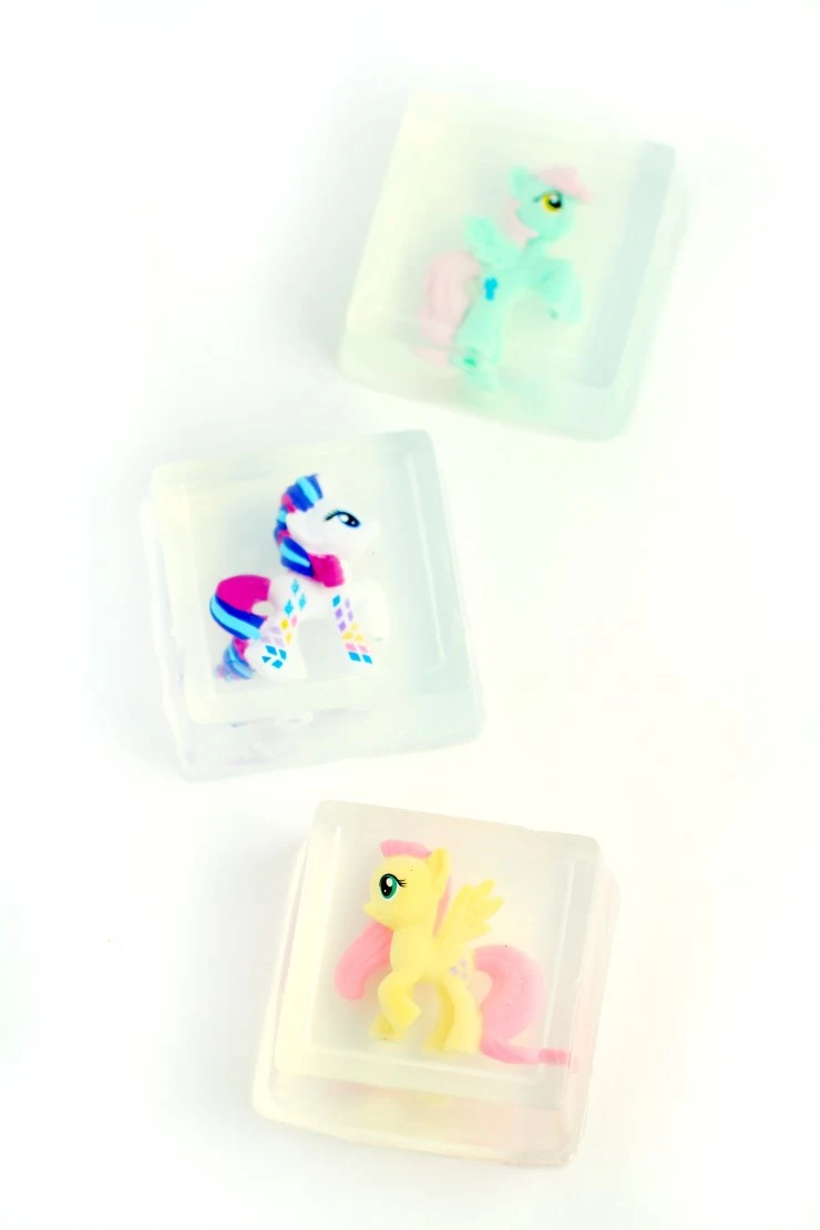 Make taking a bath or washing hands fun for kids by making handmade kids soap with toys inside. You can use any mould and small toy for this purpose. They make great stocking stuffers too!