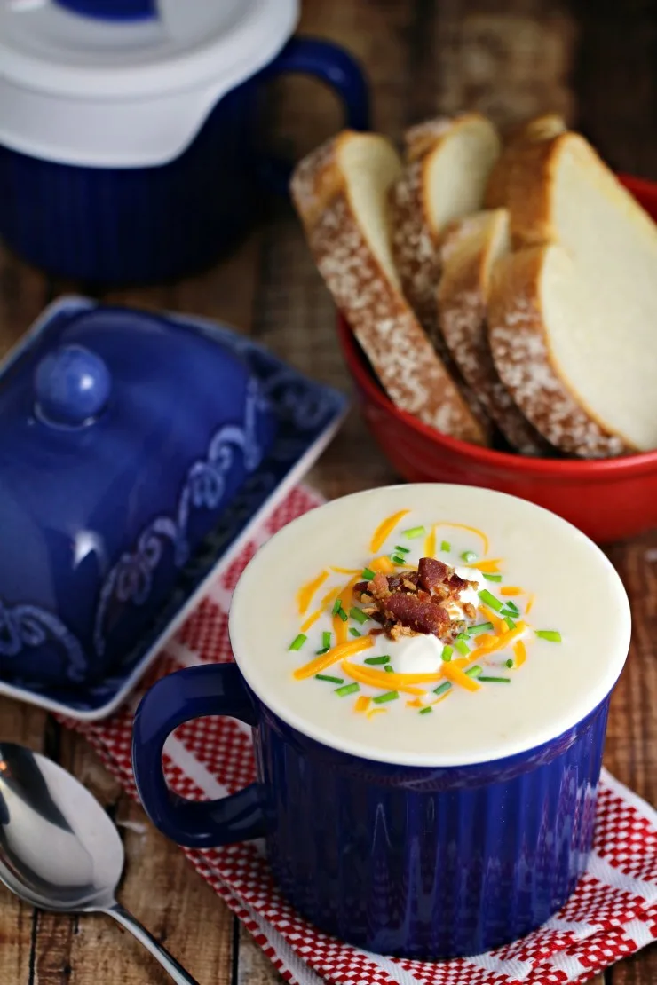 This Microwave Loaded Potato Soup in a Mug is ready in under 5 minutes flat for a delicious, creamy hot meal loaded with delicious toppings like bacon, shredded cheese and more!