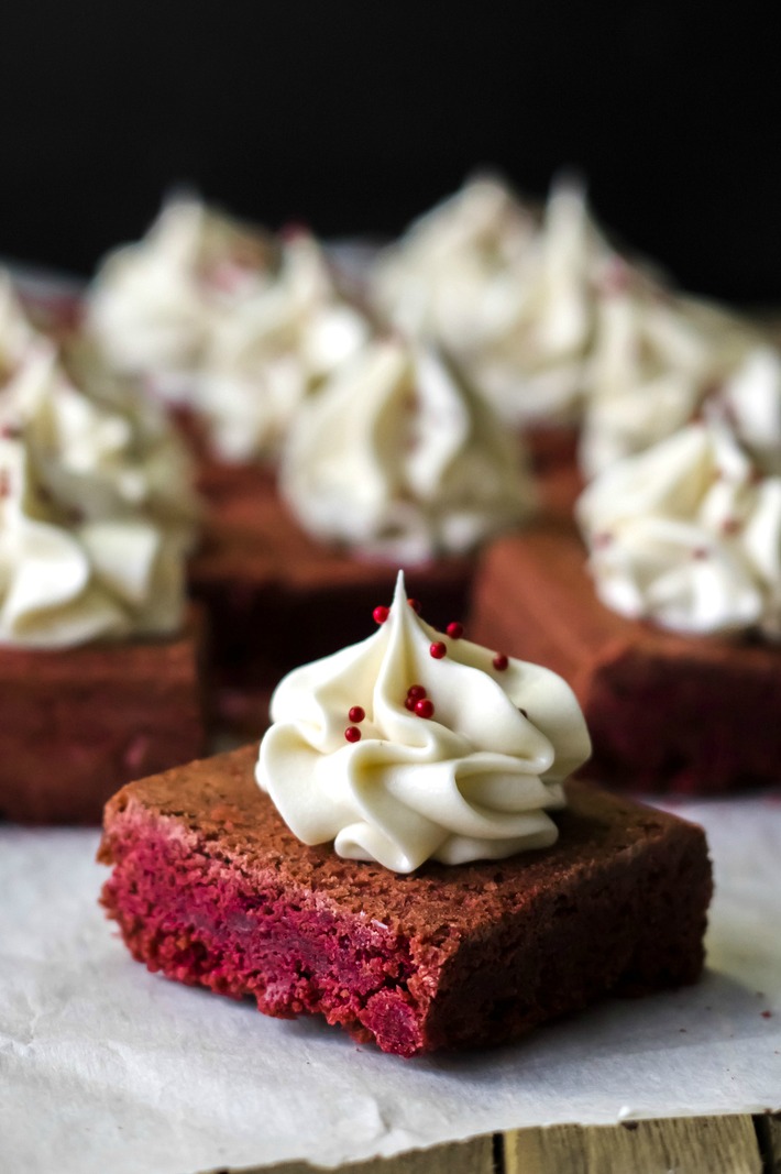 These Red Velvet Brownies with Cream Cheese Frosting combine the flavours of red velvet cake with a brownie to create an incredible brownie topped with a delectable cream cheese frosting.