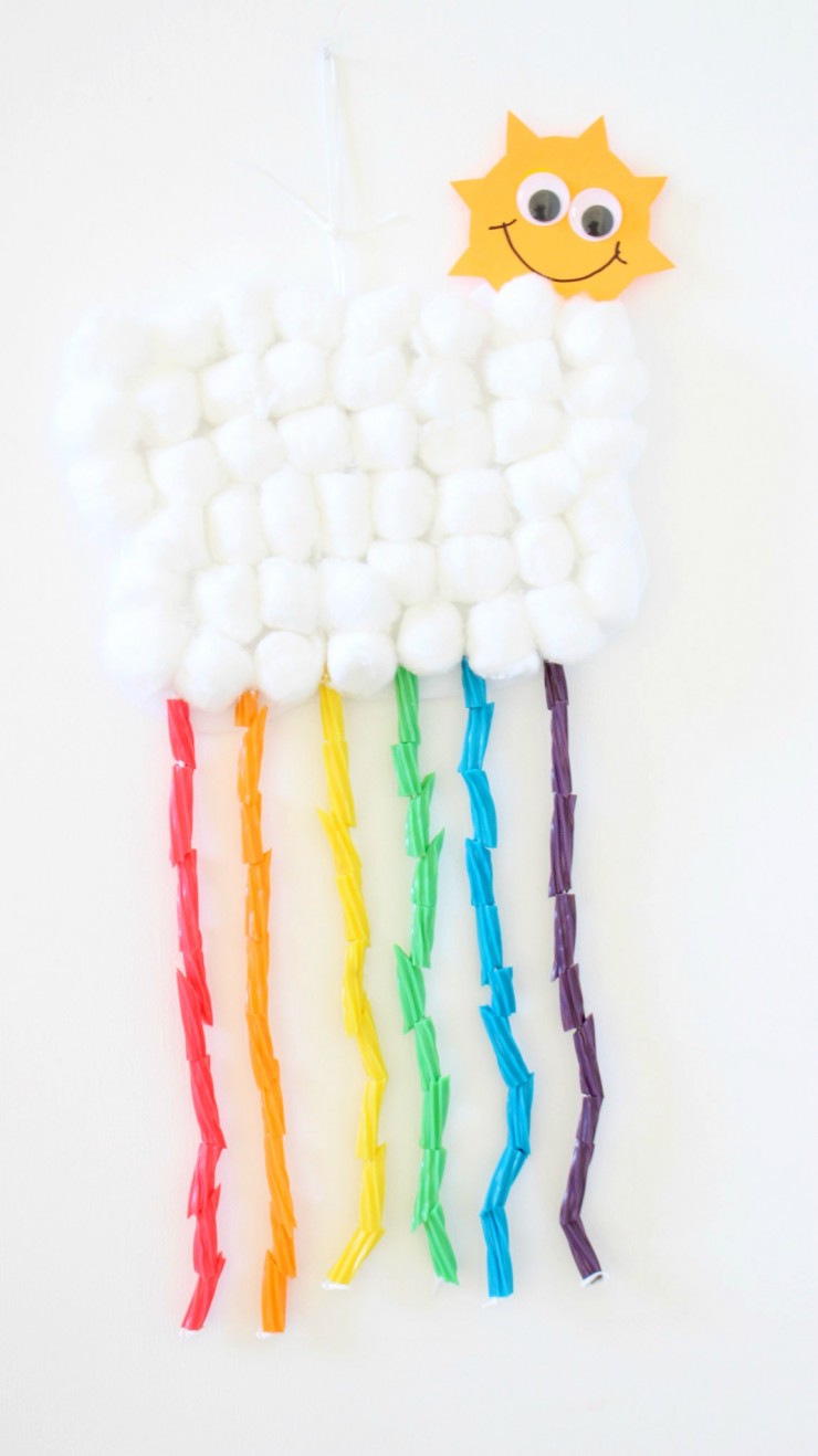 This Rainbow Cloud Mobile kids craft is a fun project for a rainy spring afternoon with preschoolers and older children. This sweet cloud and twizzler rainbow craft for kids is a great spring project!  