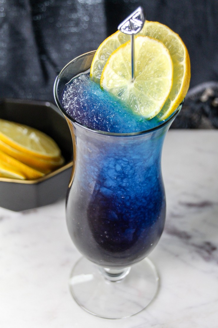 The Galaxy Mocktail is a super pretty space themed mocktail perfect for adults and kids alike. It's a refreshing slushie drink that tastes as good as it looks!