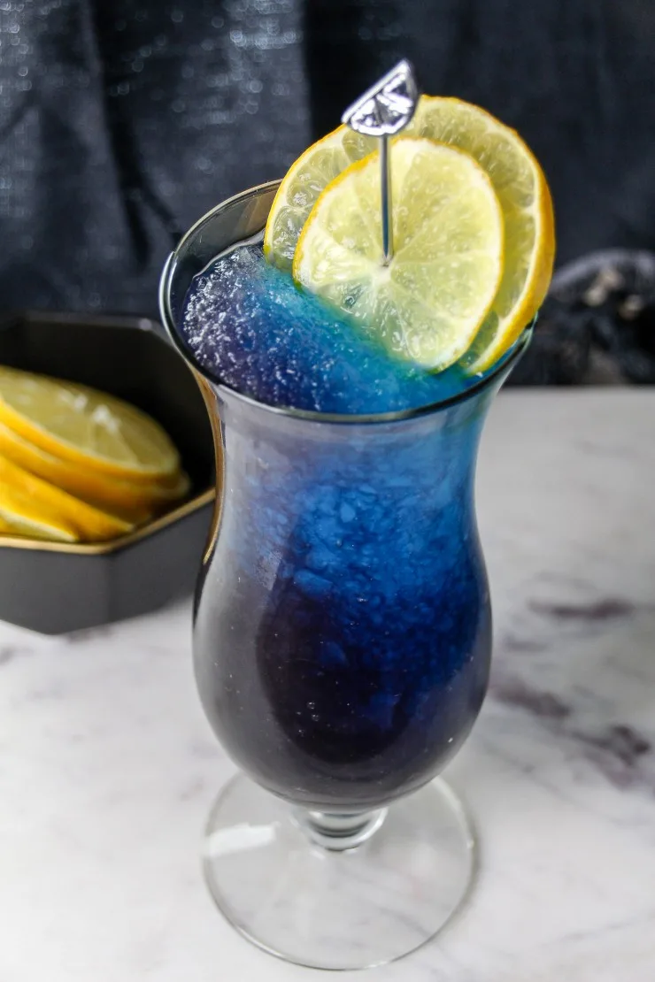 The Galaxy Mocktail is a super pretty space themed mocktail perfect for adults and kids alike. It's a refreshing slushie drink that tastes as good as it looks!