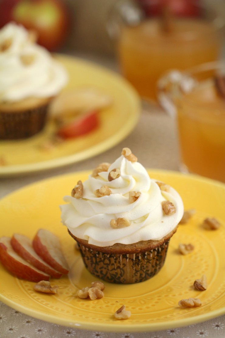 These Apple Cider Cupcakes are full of fall flavours - warm spices, apple cider, and walnuts come together in this sweet fall dessert. Can we talk about how perfect this and so beyond "pumpkin spice" for fall? Yeah. I went there. These cupcakes are way yummier. 