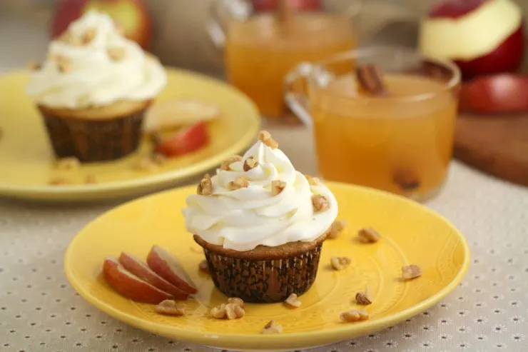 These Apple Cider Cupcakes are full of fall flavours - warm spices, apple cider, and walnuts come together in this sweet fall dessert. Can we talk about how perfect this and so beyond "pumpkin spice" for fall? Yeah. I went there. These cupcakes are way yummier. 