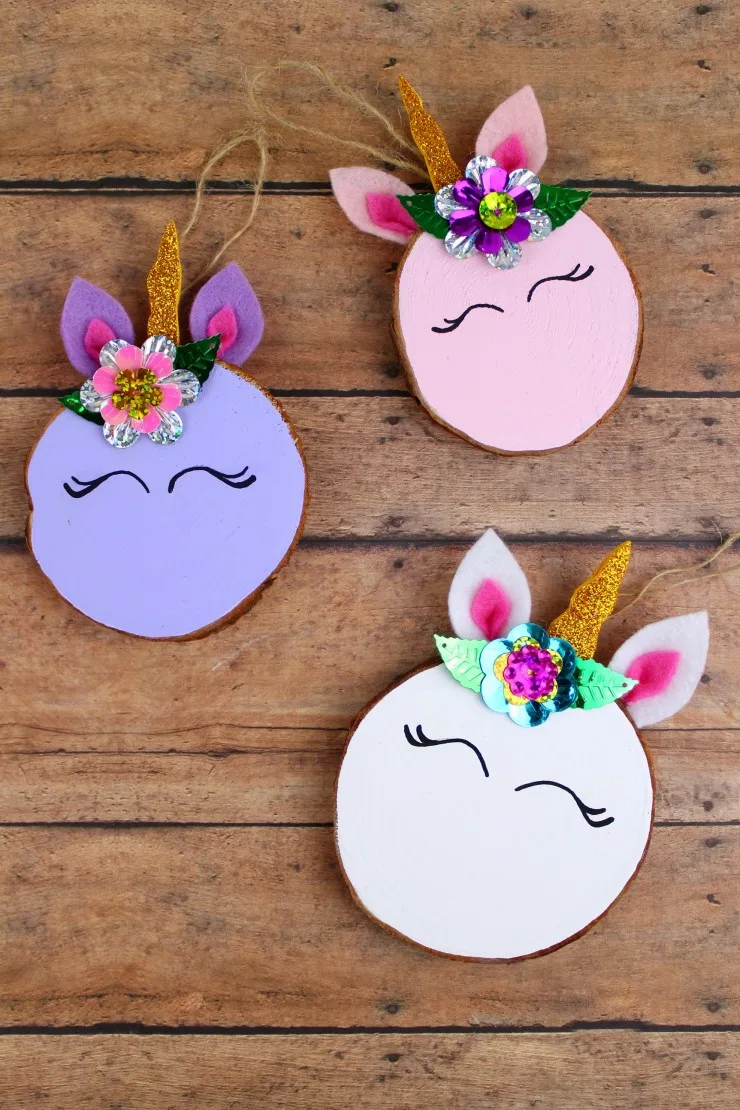  These Wood Slice Unicorn Ornaments are an adorable DIY project for you and the kids to tackle over the holiday season. They are an easy to make craft that also make for a great gift and look great on a Christmas tree. 