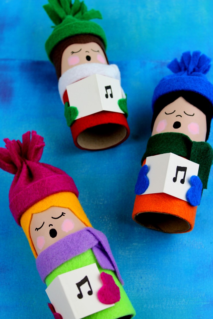 This Toilet Paper Tube Christmas Carolers craft is a great way to celebrate the season and create a unique display while re-using toilet paper rolls!