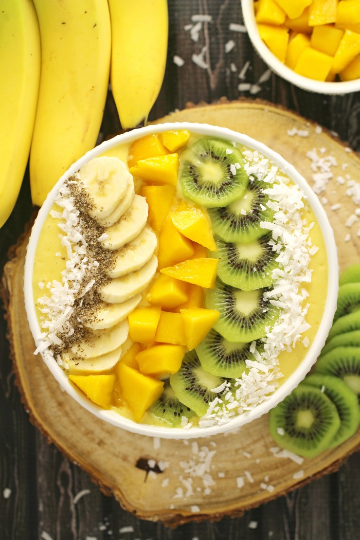  This Mango Banana Smoothie Bowl is a great choice for breakfast with the mellow sweetness of bananas and mango combined with orange juice for an irresistibly fresh bowl.  I like to use Skyr in my breakfast bowls because it adds creaminess and a load of protein but any plain yogurt will work just fine.