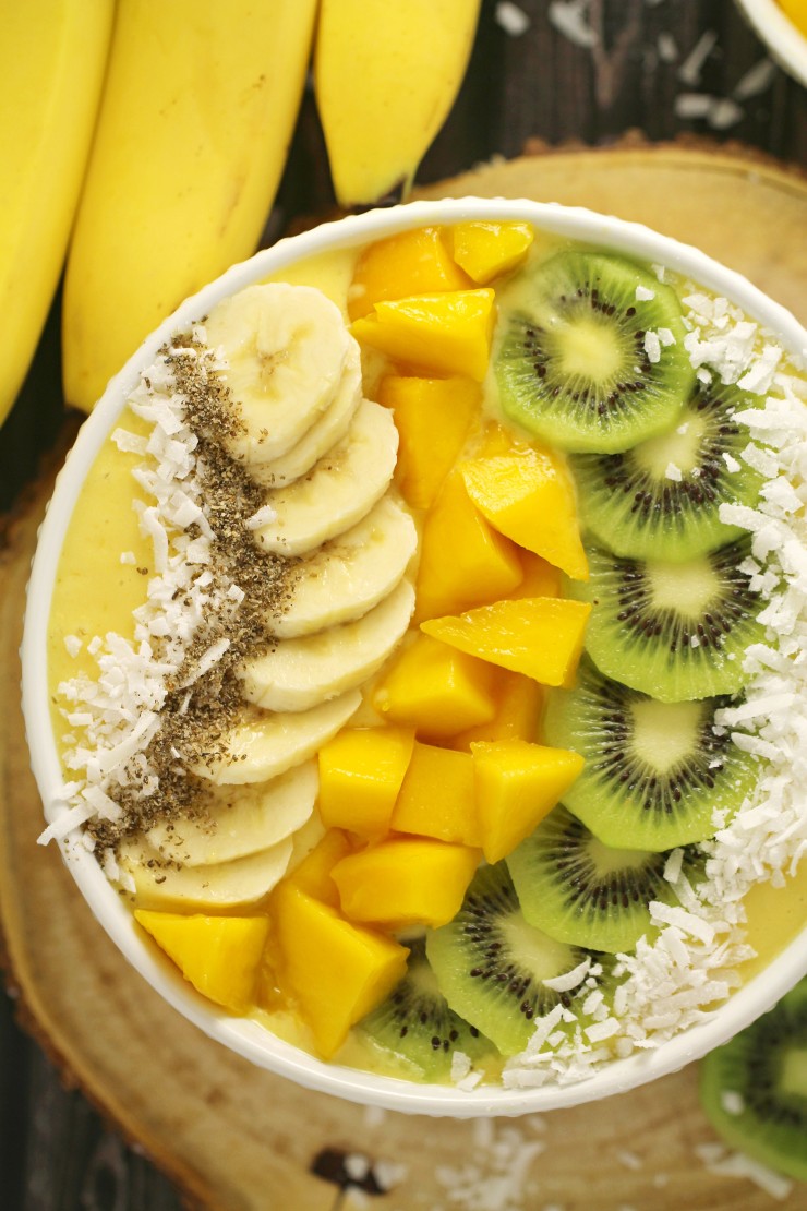  This Mango Banana Smoothie Bowl is a great choice for breakfast with the mellow sweetness of bananas and mango combined with orange juice for an irresistibly fresh bowl.  I like to use Skyr in my breakfast bowls because it adds creaminess and a load of protein but any plain yogurt will work just fine.