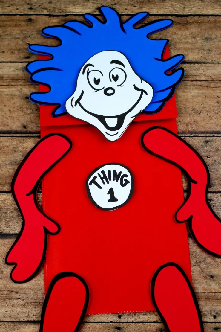 This Thing 1 and Thing 2 Paper Bag Puppet Craft is a fun kids craft that ties in really well with The Cat in the Hat. It's a perfect craft for Dr. Seuss day which is coming up on the March 2nd! 